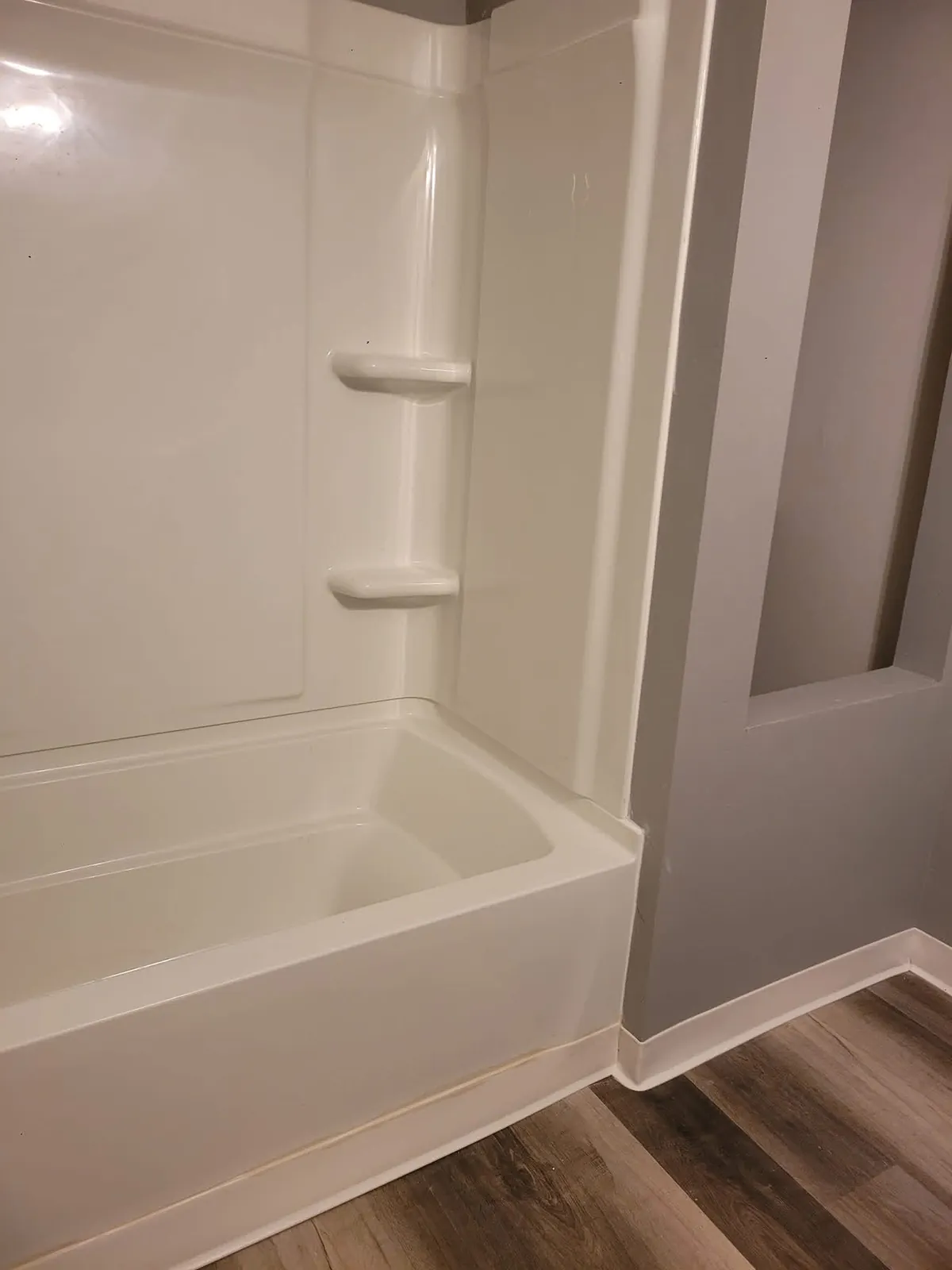 New tub and shower surround in a Sioux Falls basement bathroom