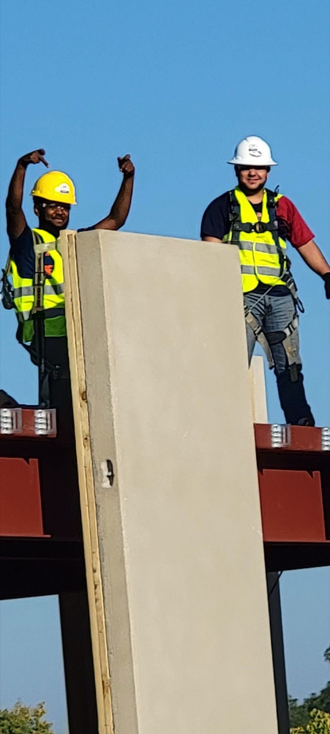 Skampy Construction crew on a steel-beam commercial job site in the Sioux Falls area